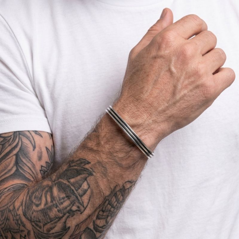 Bracciale in argento rigido lastra con righe nere