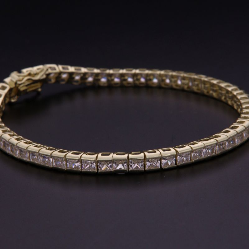 Bracciale tennis argento mm 4 dorato taglio carret 