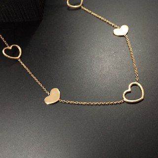 Collana in argento 925‰ cinque cuori dorata