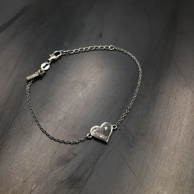 bracciale in argento 925‰ e zircone con cuore centrale inciso 