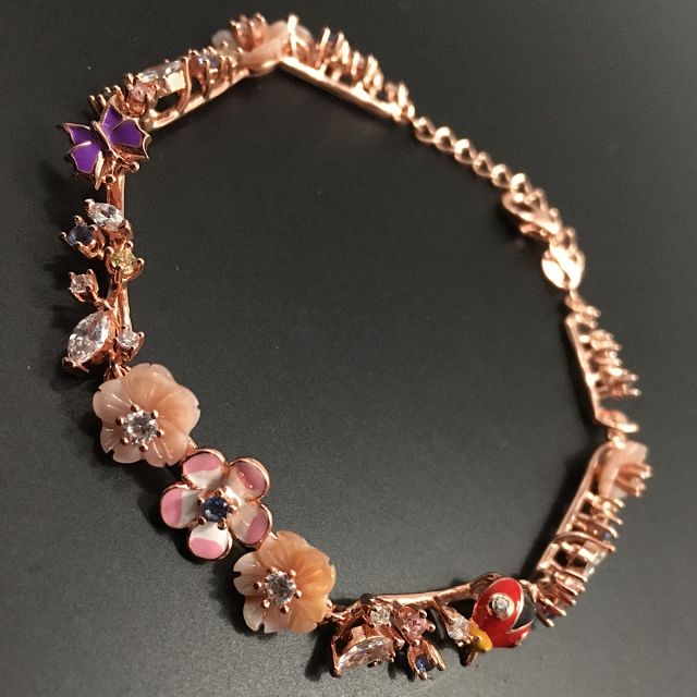 Bracciale primavera rosato con zirconi naturali 