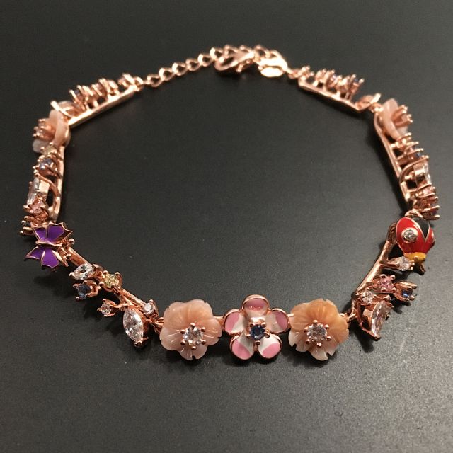 Bracciale primavera rosato con zirconi naturali 