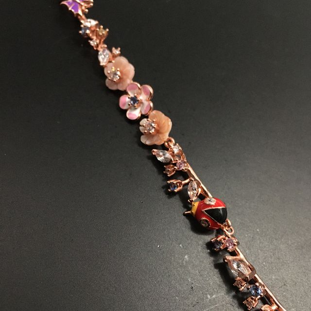 Bracciale primavera rosato con zirconi naturali 