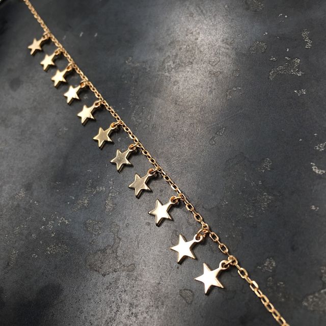 bracciale in argento 925‰ dorato con stelle pendenti