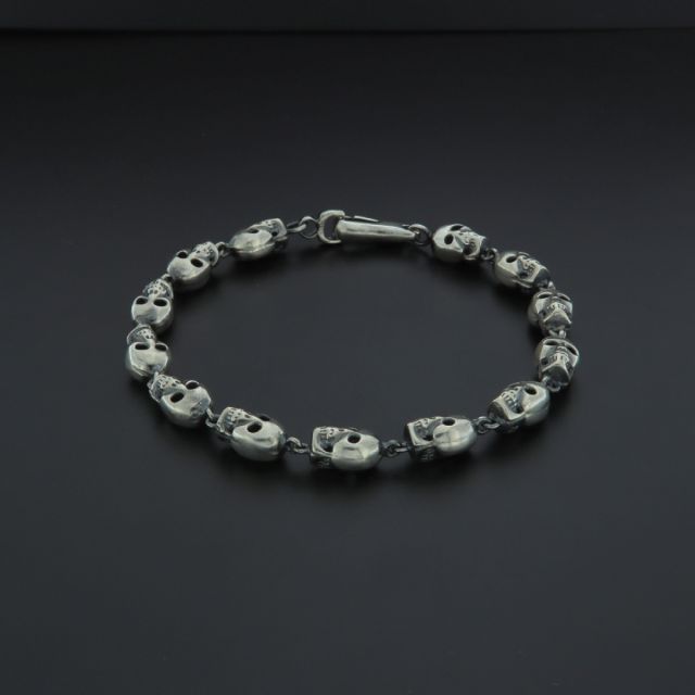 bracciale in argento 925‰ con teschi tridimensionali