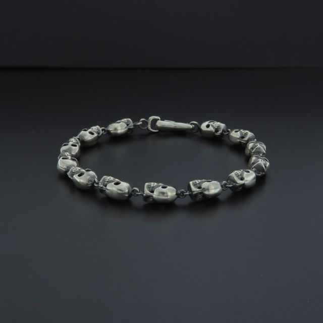 bracciale in argento 925‰ con teschi tridimensionali
