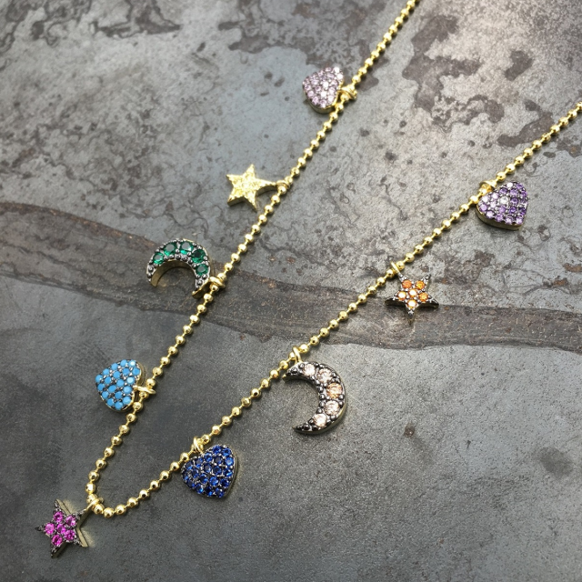 collana pallina diamantata con lune stelle cuori pavè 